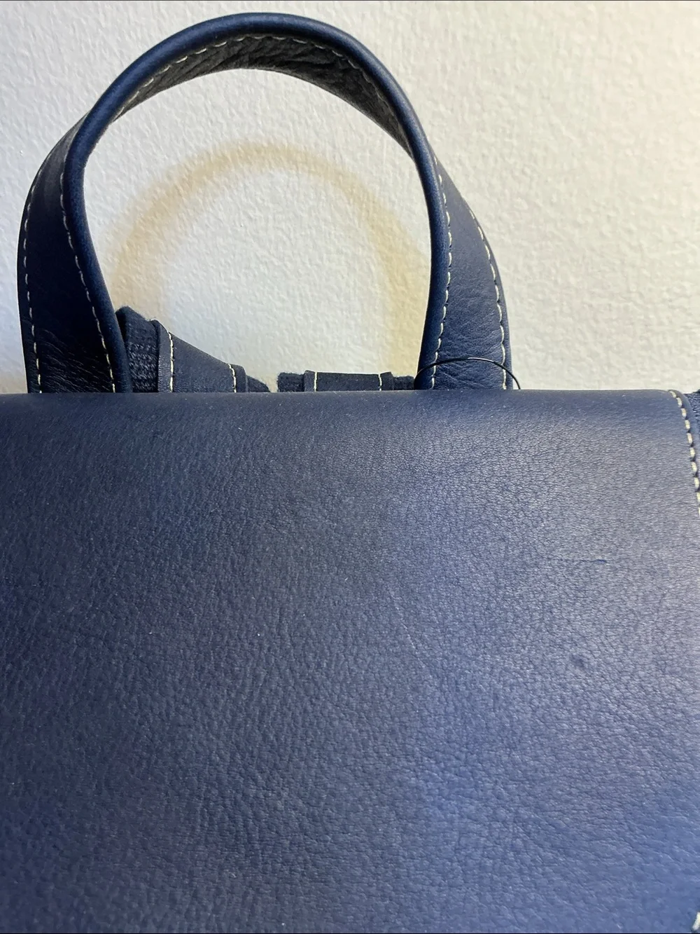 Navy blue leather backpack